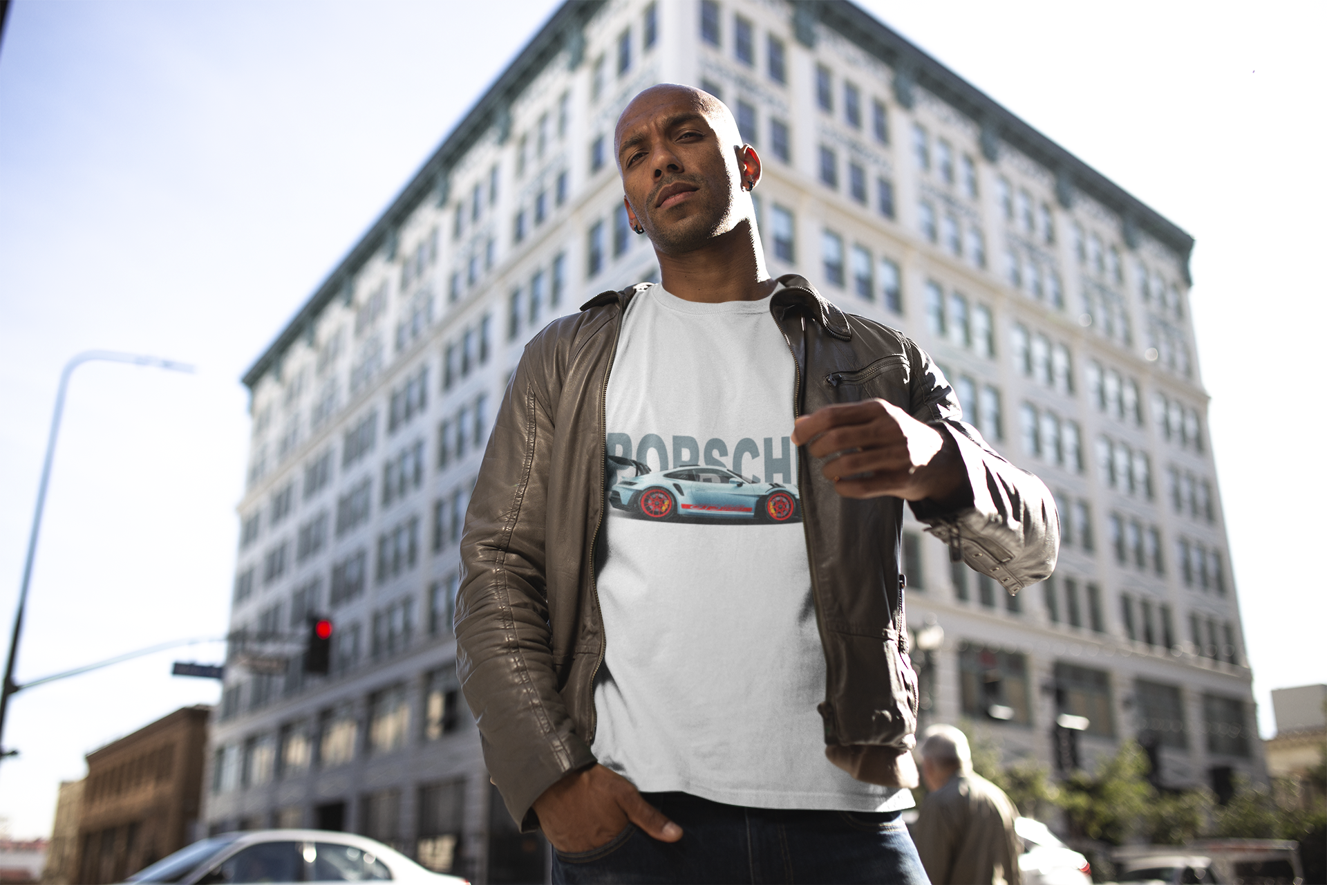 round-neck-tee-mockup-featuring-a-man-in-the-city-18312 Minimal Porsche sports car t-shirt design Luxury car graphic tee for Porsche fans Premium automotive streetwear t-shirt